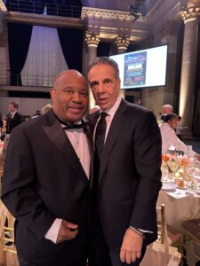 Dominic Carter stands with former New York Governor Andrew Cuomo, now a candidate for New York City Mayor, at the 81st Annual Columbus Celebration Gala at Cipriani. The photo captures a moment highlighting leadership, culture, and New York pride.